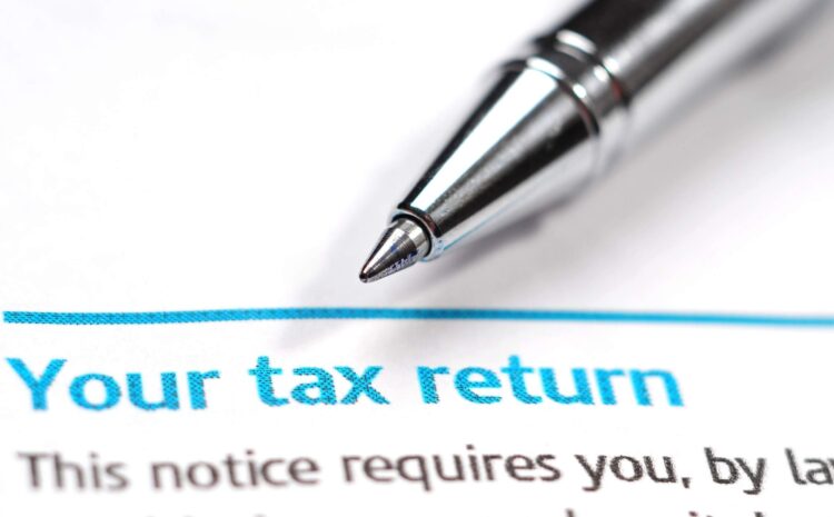 Clients and professional accountants collaborating on tax returns, representing Apex Flow Accountancy's seamless financial services in the UK.
